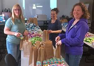 UDC employees packing lunch bags