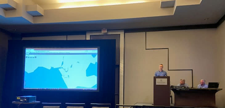 Dax Wolfinger of UDC giving a presentation of AVANGRID's outage dashboard