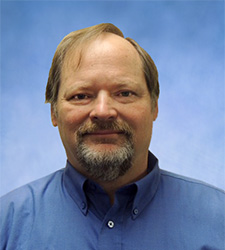 Tom Helmer, Executive Solution Architect headshot